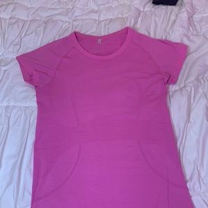 I’m selling a neon pink lululemon swiftly tech short sleeve top